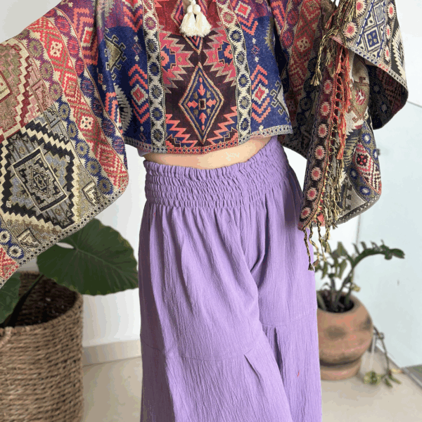 Capita / Poncho Lila
